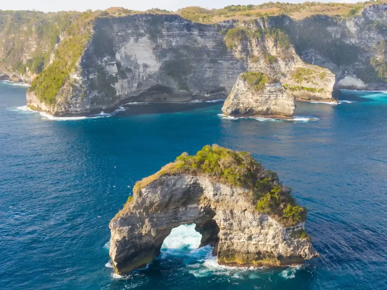 Banah Cliff and its sea arch on the west coast of Nusa Penida